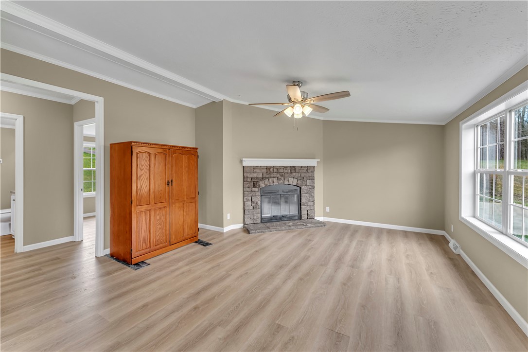 12082 State Highway Walton, NY 13856 - Photo 13 of 28 Family room with stone-faced wood-burning fireplace