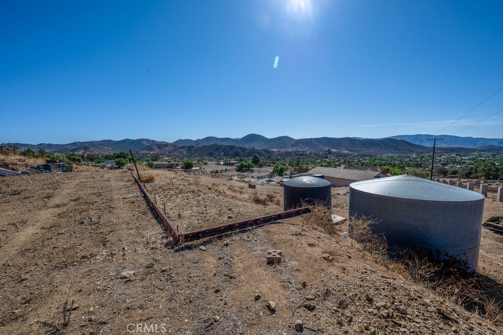 9555 1/2 Hierba Road Agua Dulce, CA 91390 - Photo 21 of 26 a view of a terrace with a table and chairs
