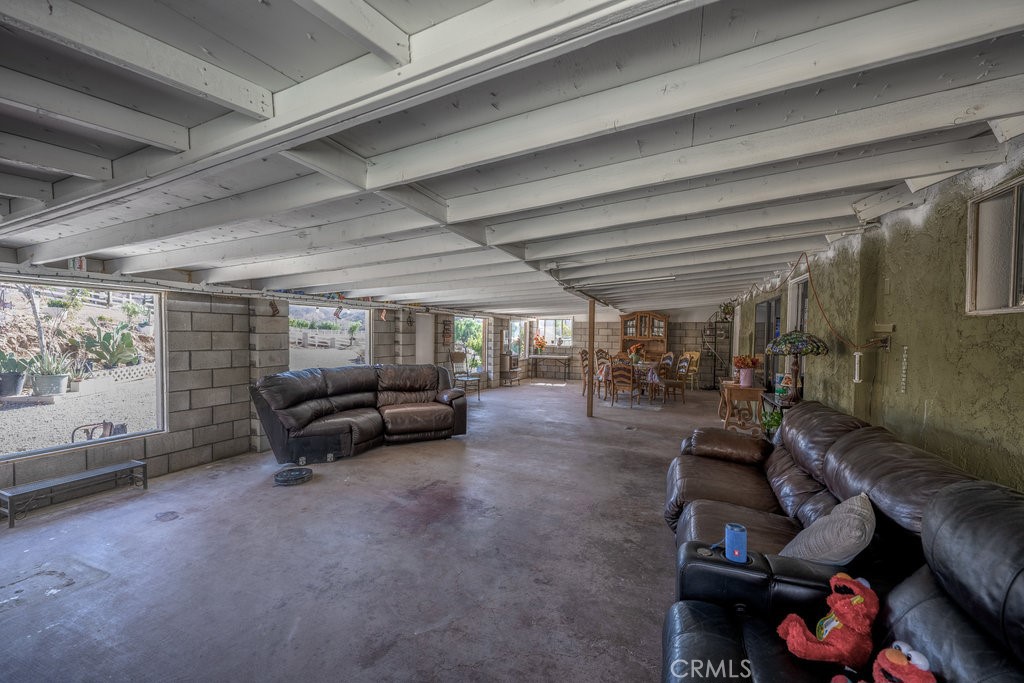 9555 1/2 Hierba Road Agua Dulce, CA 91390 - Photo 5 of 26 a view of a garage with furniture