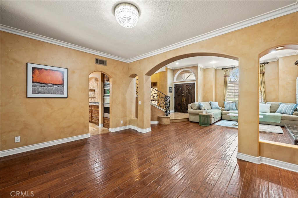 25 Vía Terracaleta Coto de Caza, CA 92679 - Photo 12 of 23 a view of a livingroom with furniture and hardwood floor