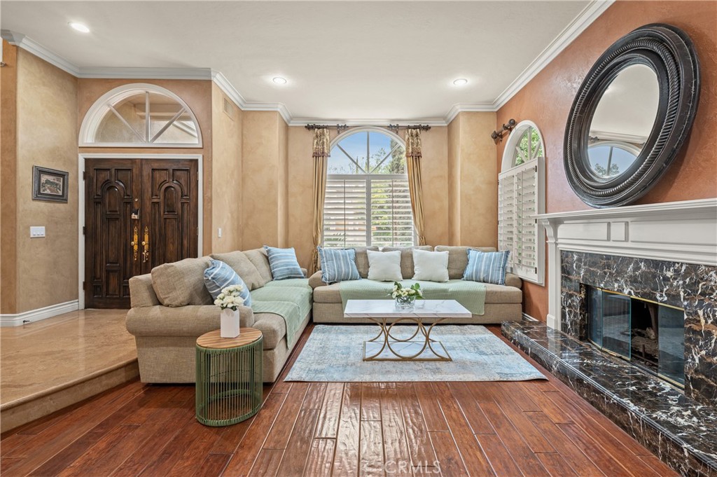 25 Vía Terracaleta Coto de Caza, CA 92679 - Photo 15 of 23 a living room with furniture a fireplace and a fireplace