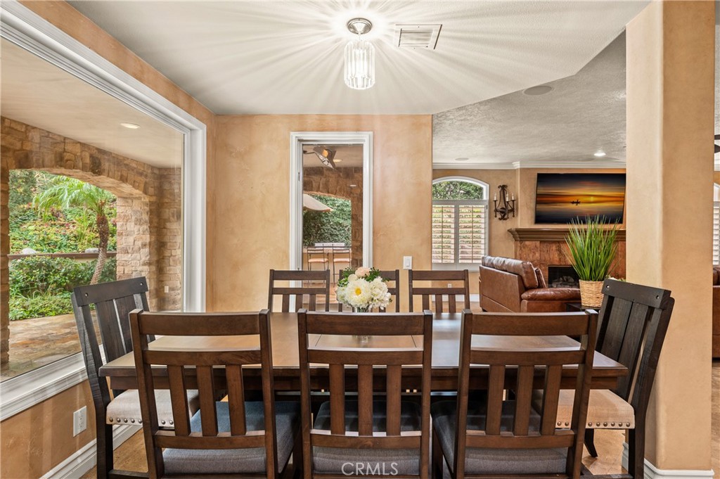 25 Vía Terracaleta Coto de Caza, CA 92679 - Photo 9 of 23 a view of a dining room with furniture window and outside view