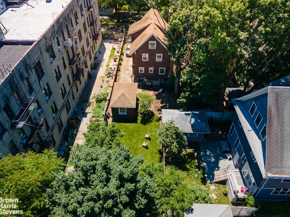 1917 Glenwood Road Brooklyn, NY 11230 - Photo 19 of 22 a view of a house with a yard