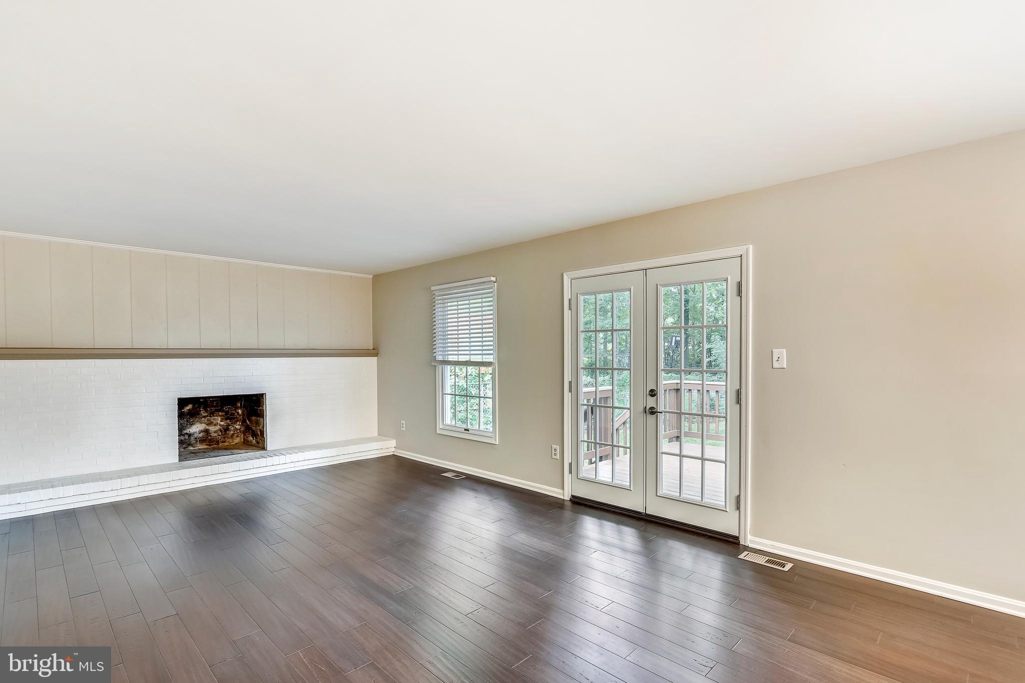 129 Summit Hall Road Gaithersburg, MD 20877 - Photo 19 of 48 Family room with NEW wide plank hardwoods