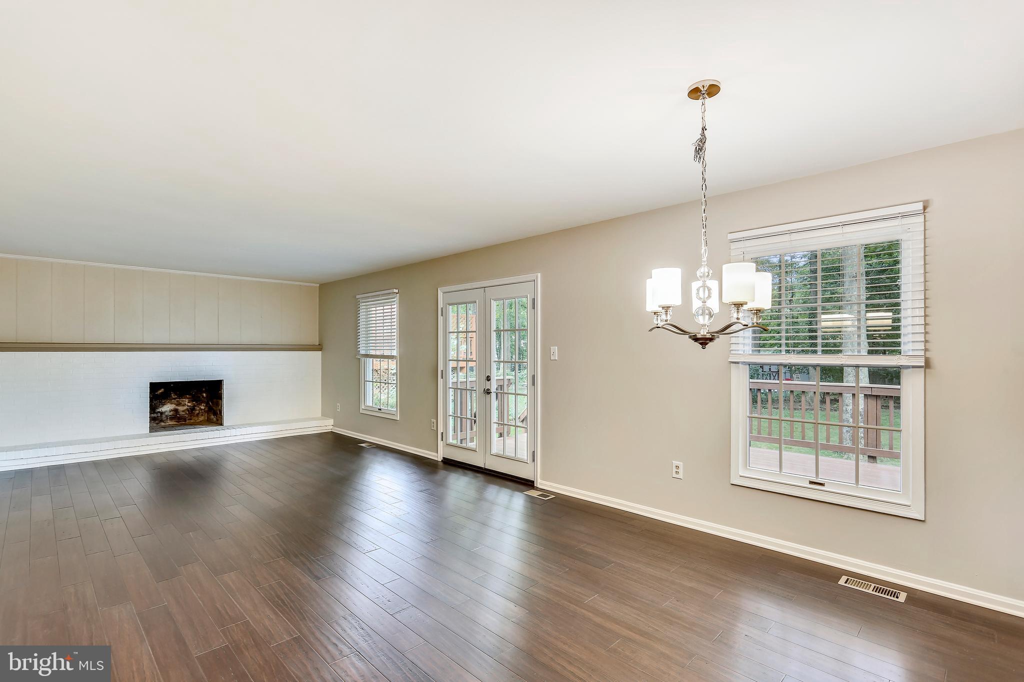 129 Summit Hall Road Gaithersburg, MD 20877 - Photo 23 of 48 Breakfast room with chandelier