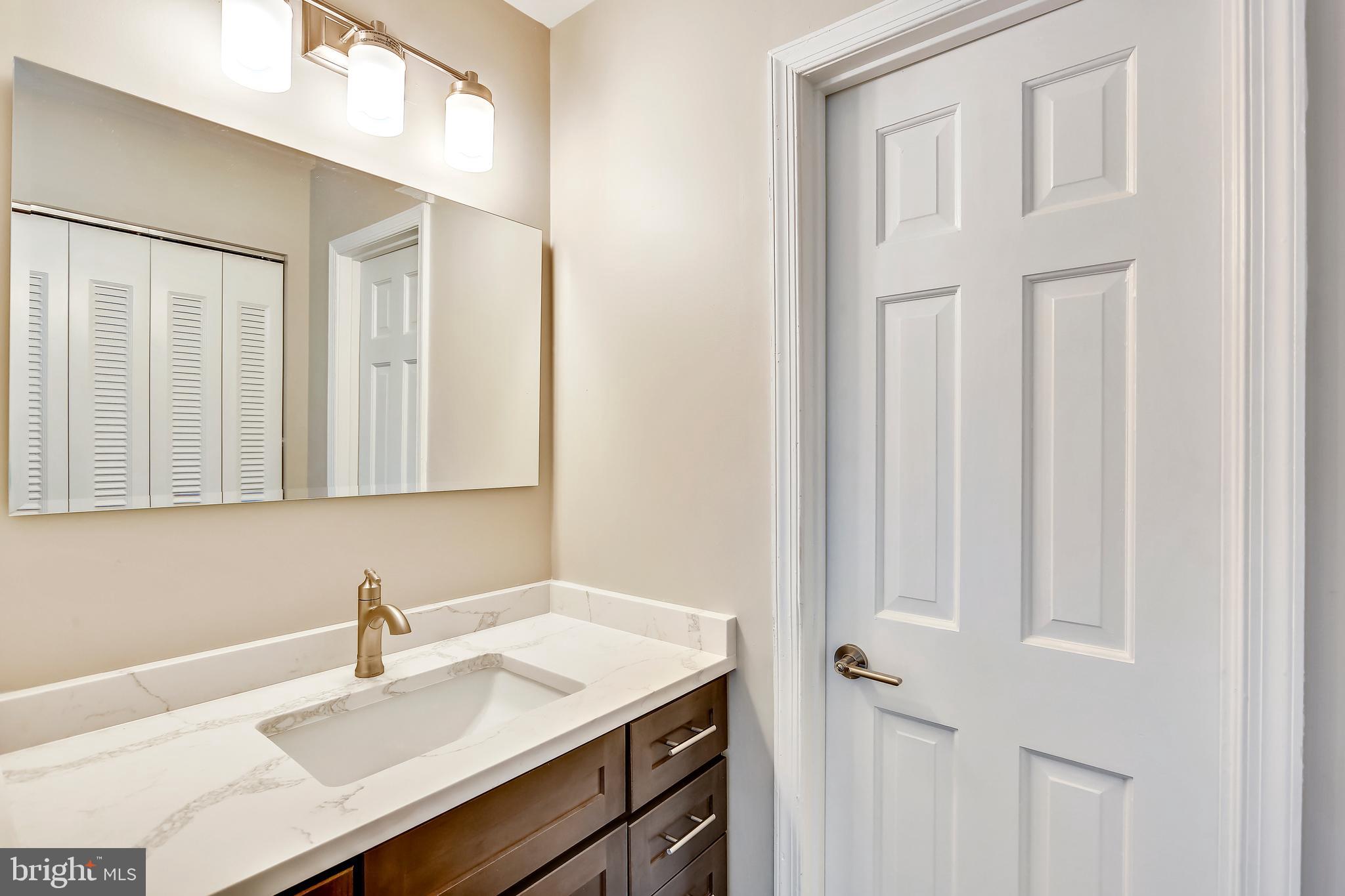 129 Summit Hall Road Gaithersburg, MD 20877 - Photo 26 of 48 Luxury master bath with quartz vanities
