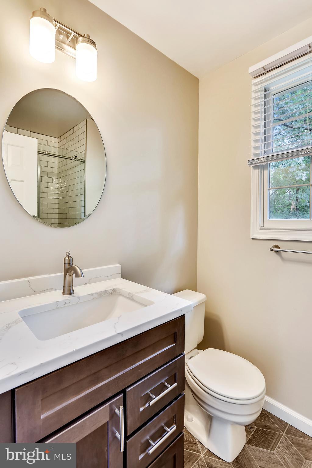 129 Summit Hall Road Gaithersburg, MD 20877 - Photo 27 of 48 Master bath with designed ceramic tile flooring