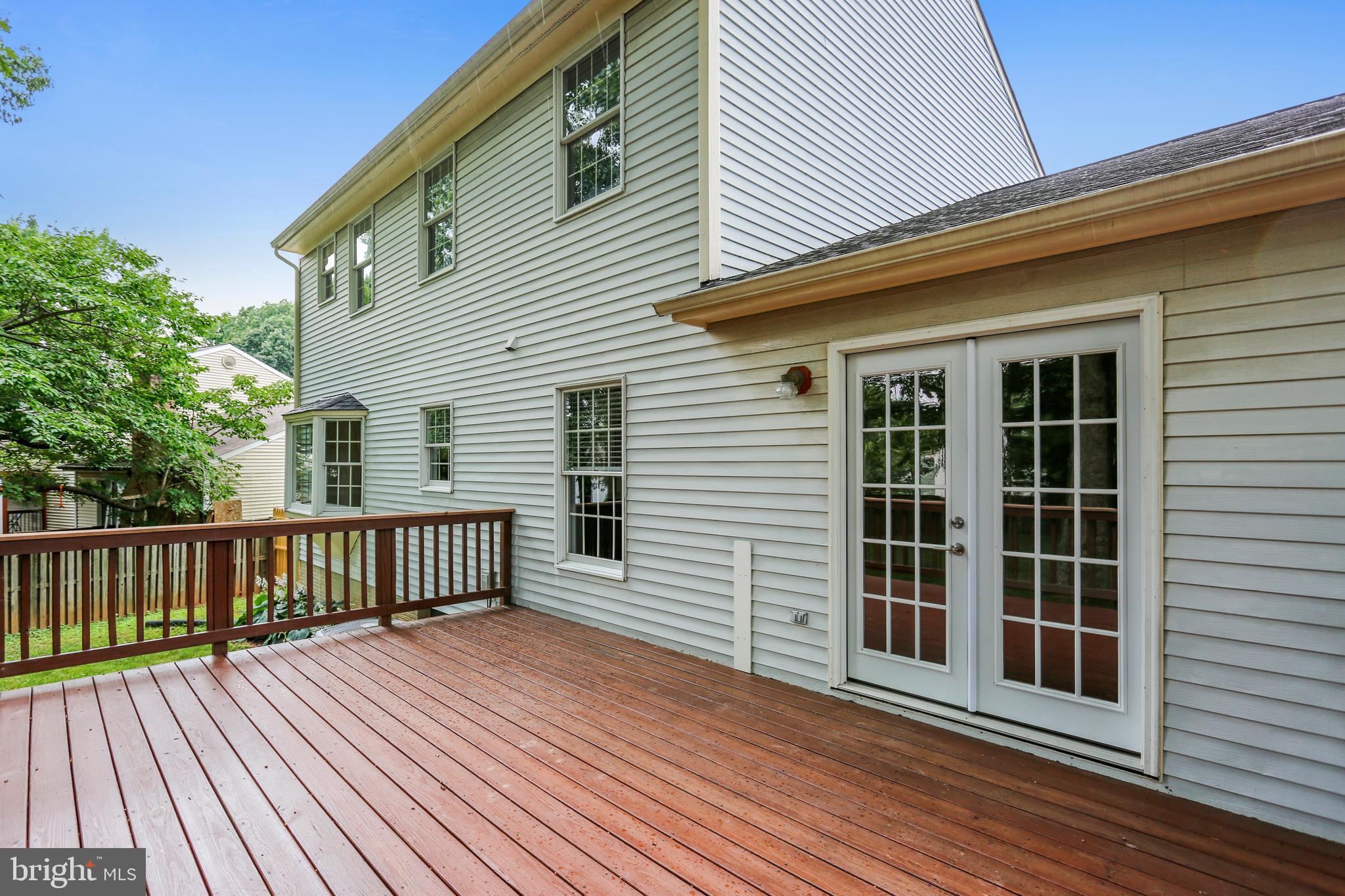 129 Summit Hall Road Gaithersburg, MD 20877 - Photo 33 of 48 Rear deck with access from family room