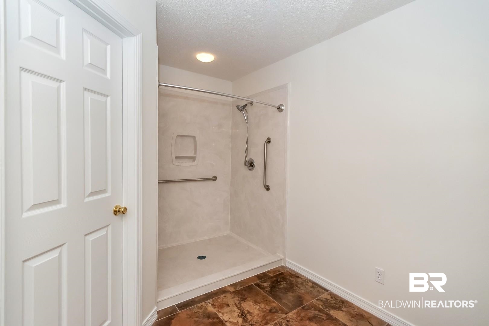 672 Spring Lake Drive East Mobile, AL 36695 - Photo 14 of 26 Bathroom with walk in shower, baseboards, and a textured ceiling