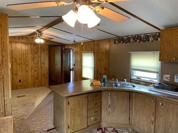 557 Southwest Cutoff, Unit 110 Worcester, MA 01607 - Photo 4 of 8 a bathroom with a sink and a mirror