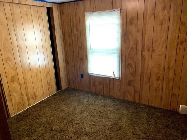 557 Southwest Cutoff, Unit 110 Worcester, MA 01607 - Photo 5 of 8 an empty room with windows