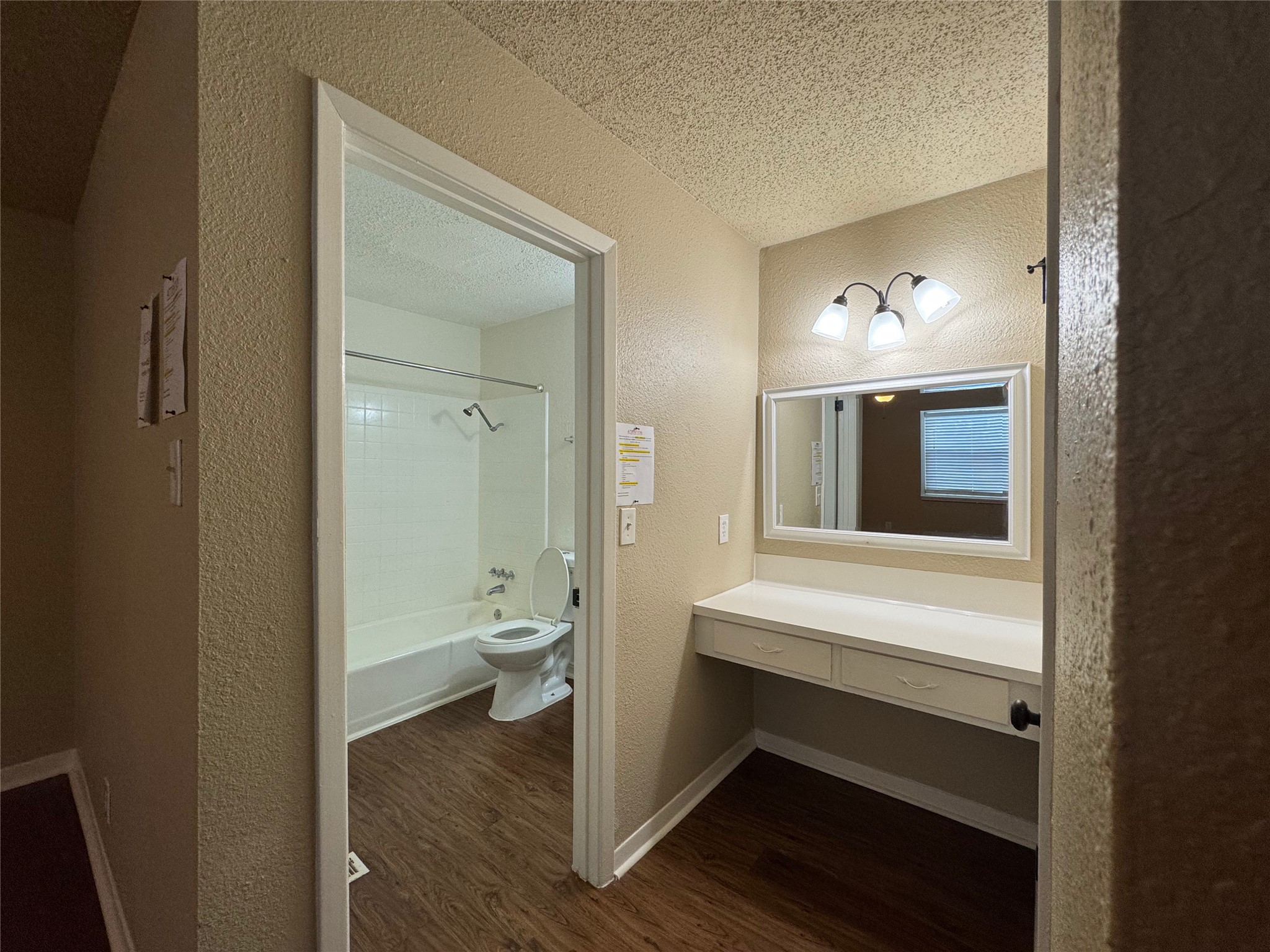 5006 West Wind Trail, Unit 101 Austin, TX 78745 - Photo 13 of 18 a bathroom with a toilet
