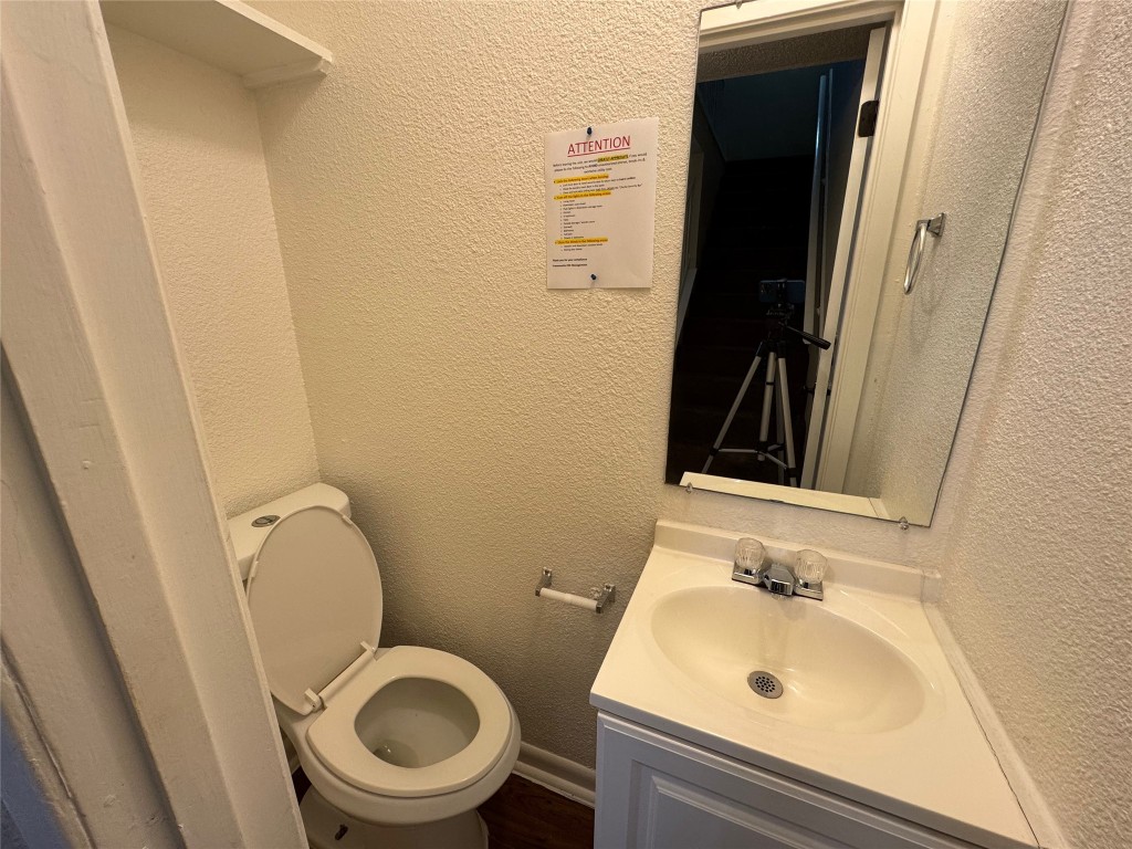 5006 West Wind Trail, Unit 101 Austin, TX 78745 - Photo 8 of 18 a bathroom with a sink and a toilet