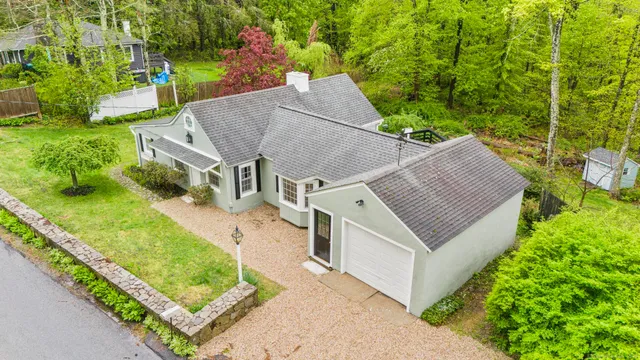 an aerial view of a house with garden