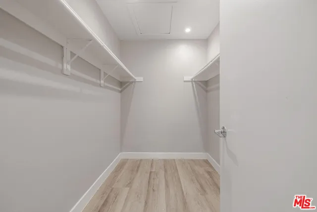 a view of room with racks on the wall