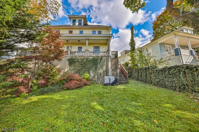 a view of a back yard of the house