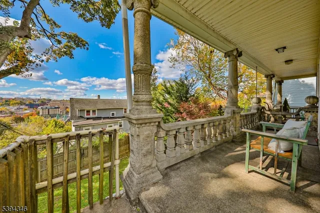 a view of a swimming pool with a yard