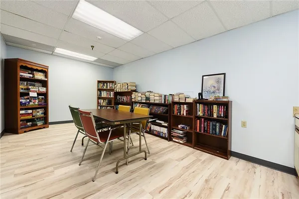 a view of a workspace with furniture
