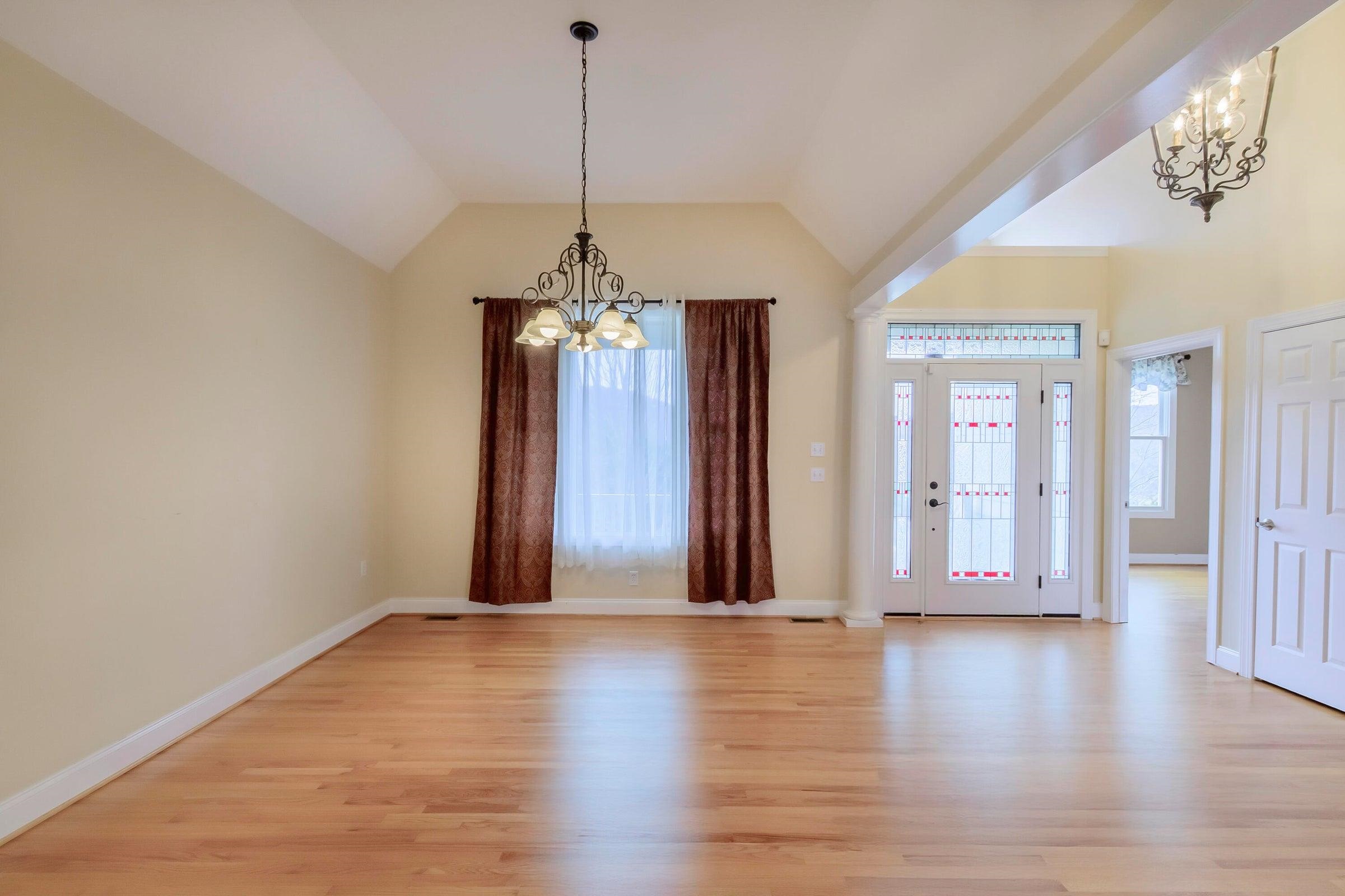 120 Springridge Lane Fairfield, VA 24435 - Photo 14 of 56 a view of a room with wooden floor chandelier and windows