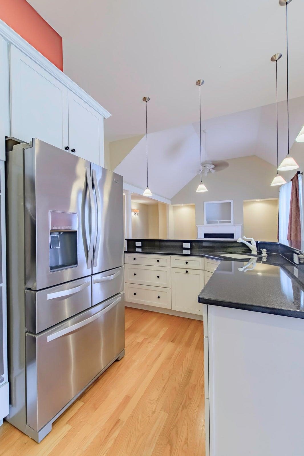 120 Springridge Lane Fairfield, VA 24435 - Photo 30 of 56 a kitchen with kitchen island a counter a sink and a refrigerator