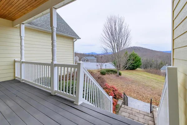 a view of a house with a mountain yard