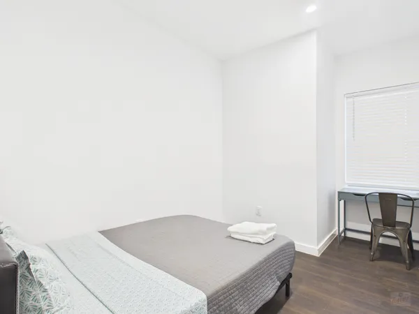 a room with a table and chairs