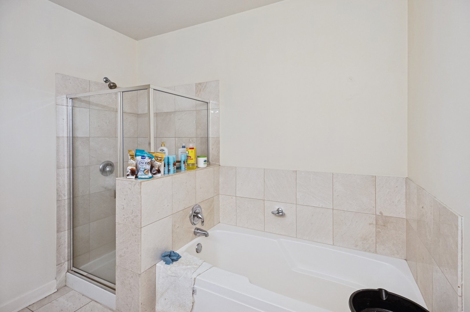 450 East Waterside Drive, Unit 2902 Chicago, IL 60601 - Photo 14 of 44 a bathroom with a bathtub and a shower