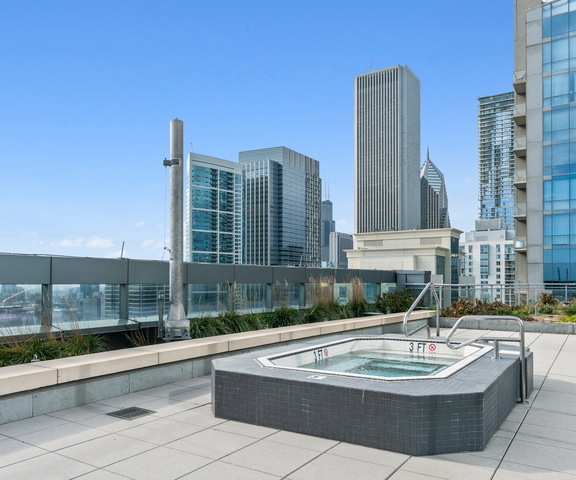 450 East Waterside Drive, Unit 2902 Chicago, IL 60601 - Photo 44 of 44 a view of a swimming pool with a patio