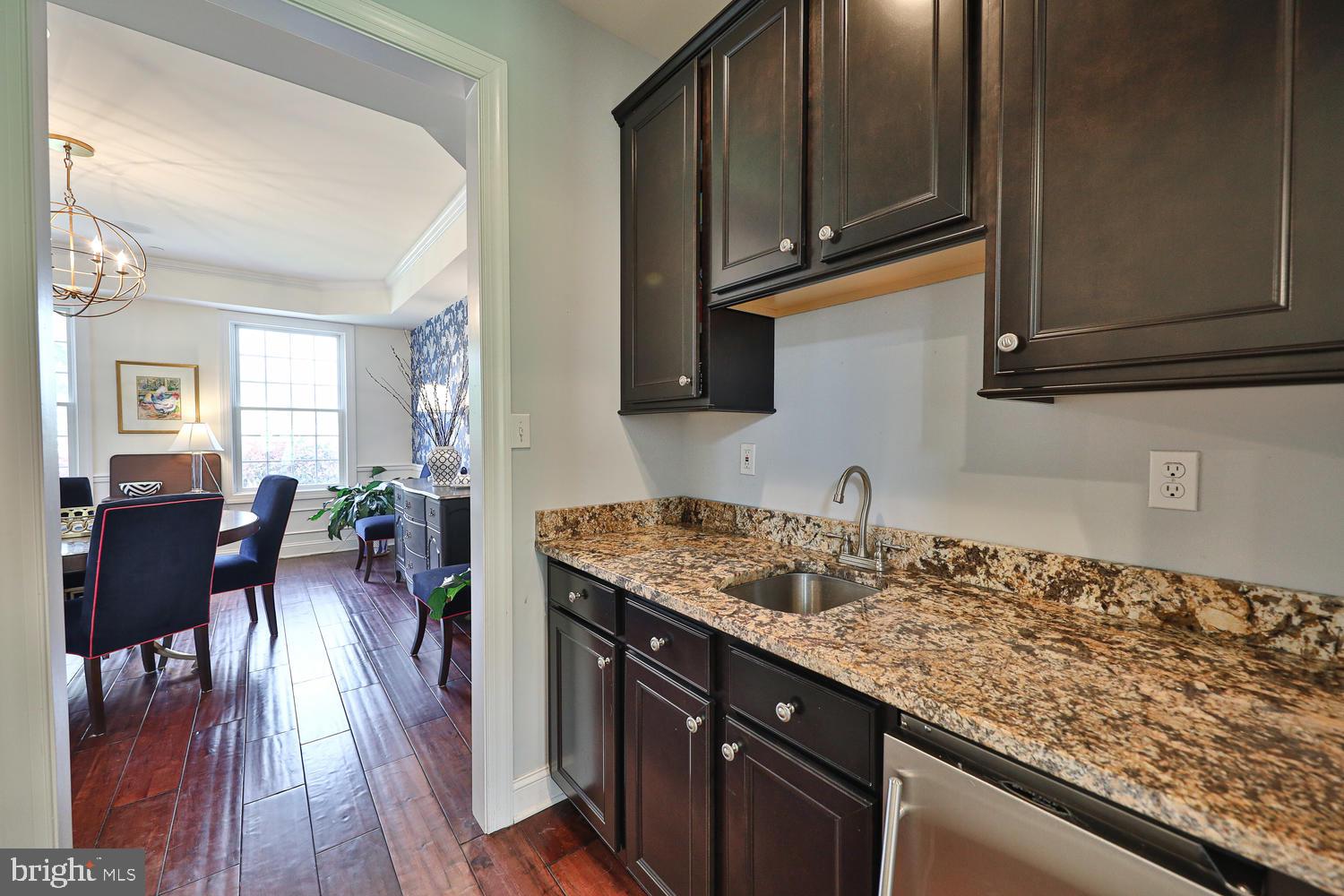 420 Ambler Road Fort Washington, PA 19034 - Photo 8 of 36 Butler's Pantry w/ Sink, Ice Maker and Fridge