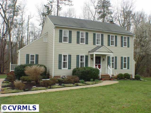 Exterior Front - Lovely cul-de-sac setting and backing up to woods