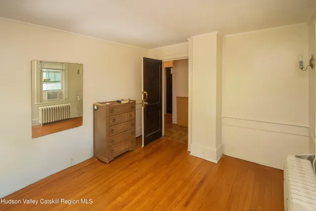 a view of a bathroom with a shower curtain