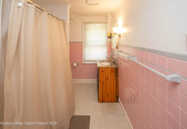 a bathroom with a sink and a toilet
