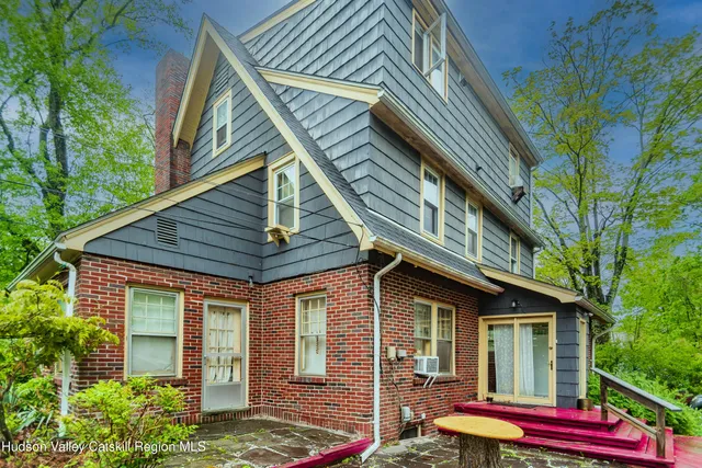 a backyard of a house with seating space