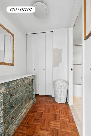 a bed room with a bed and a chair