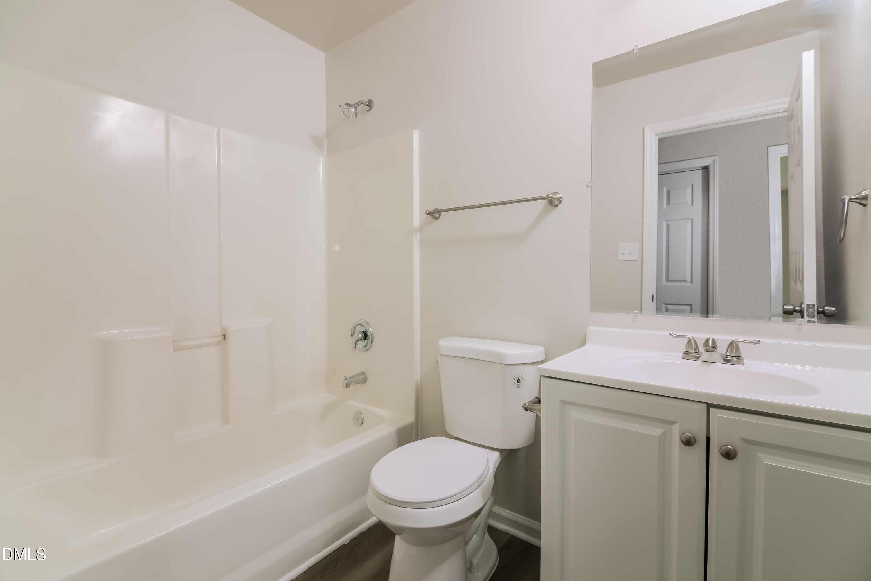 5201 Pronghorn Lane Raleigh, NC 27610 - Photo 14 of 16 a bathroom with a sink toilet and shower