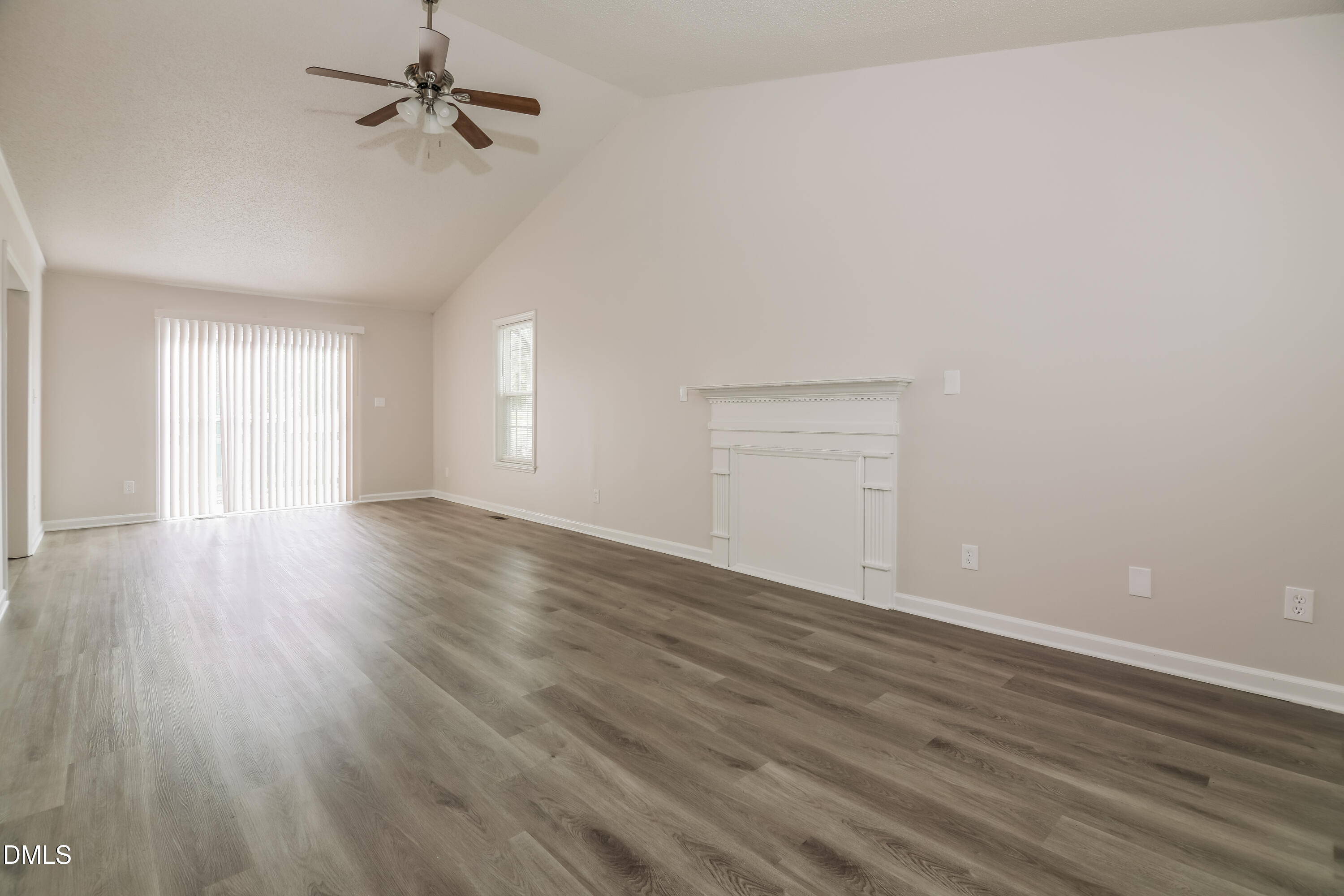 5201 Pronghorn Lane Raleigh, NC 27610 - Photo 2 of 16 wooden floor in an empty room with a window