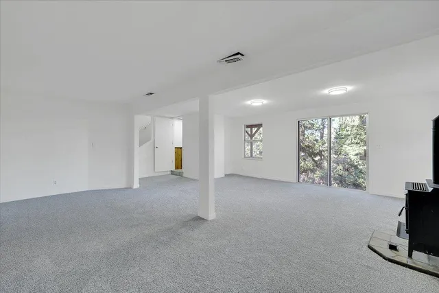a view of a livingroom with a fireplace