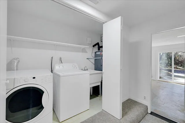 a view of balcony with wooden floor and fence