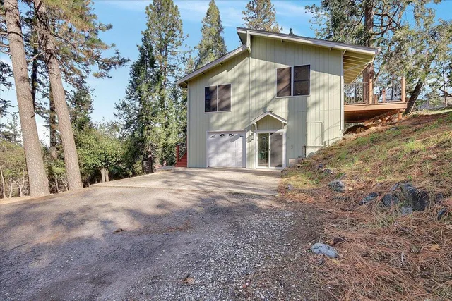 a view of street with large trees