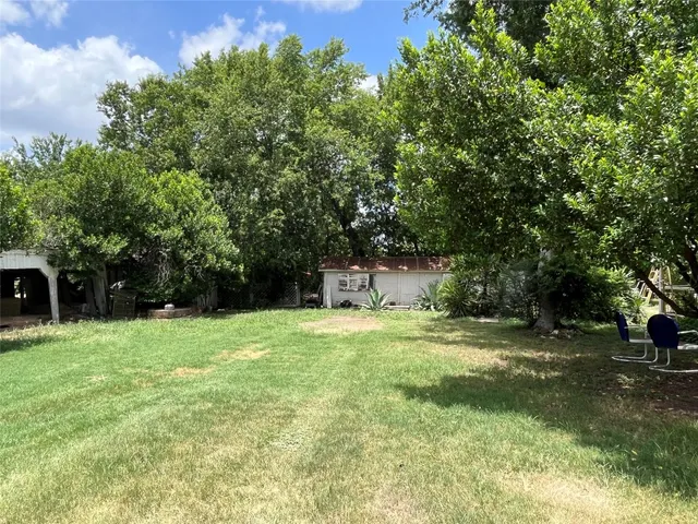 a fire hydrant in the middle of a field
