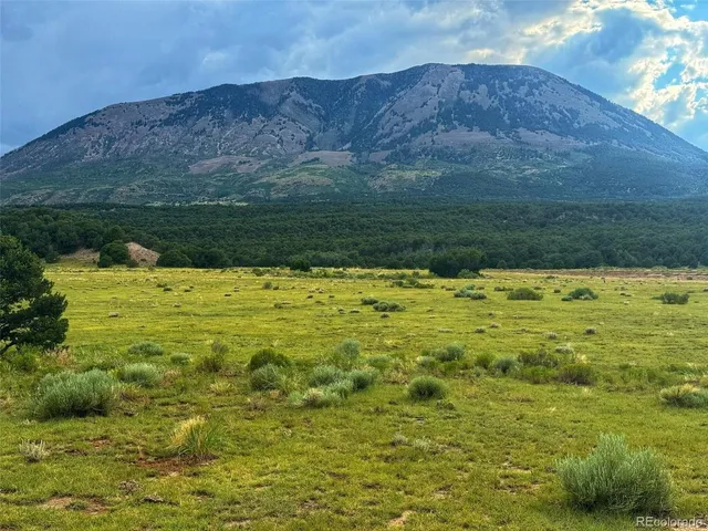 a view of a lake with a mountain in the background