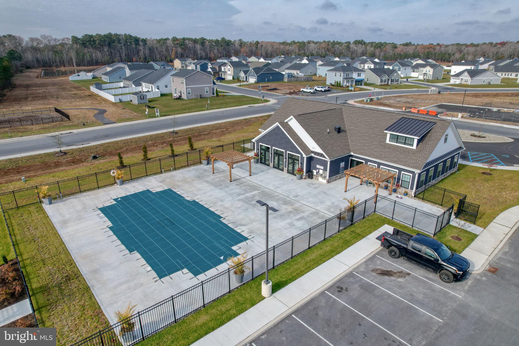 653 Cpl Rodney Wayne Wilson Loop Georgetown, DE 19947 - Photo 54 of 55 a view of a swimming pool with a lounge chairs
