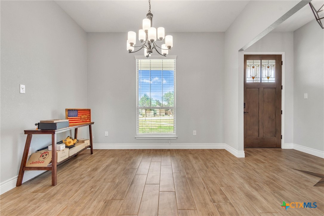 3919 Gracey Lane Kempner, TX 76539 - Photo 25 of 44 a view of livingroom with hardwood floor and hallway