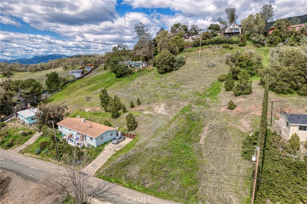 7037 Butte Street Nice, CA 95464 - Photo 12 of 16 a view of a lake with a yard