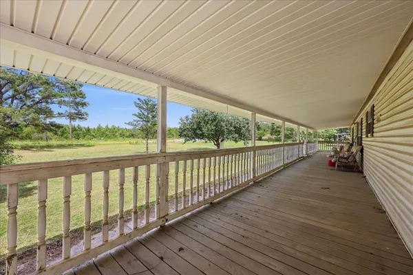 a view of railway station with wooden floor