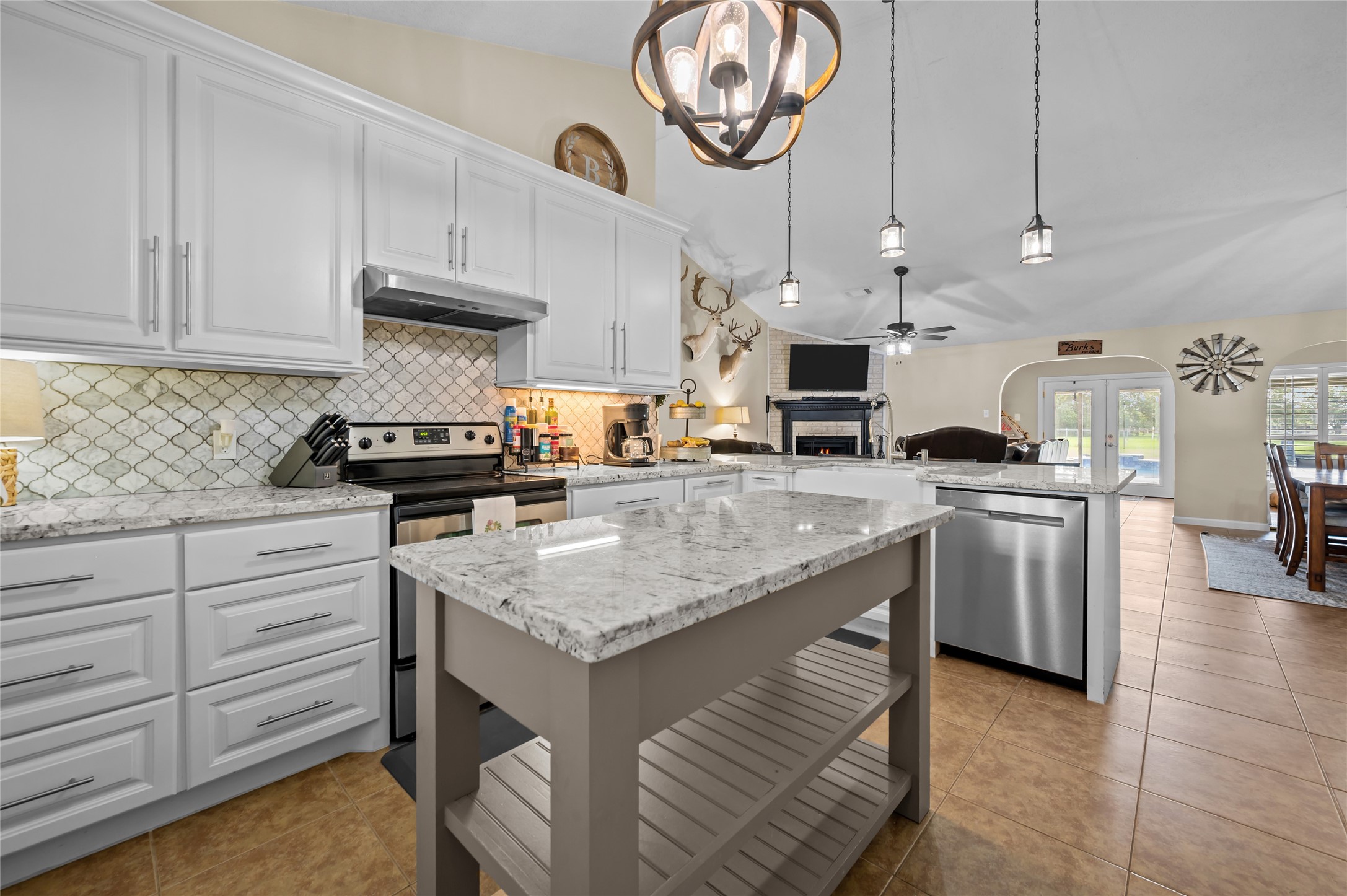4602 Joe Patch Road Cove, TX 77523 - Photo 13 of 40 The kitchen is open to the family room and dining space