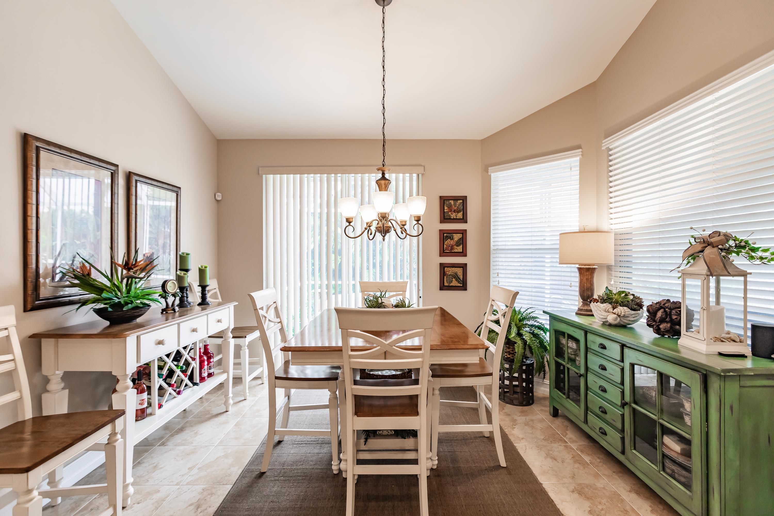 31 Tahiti Road Marco Island, FL 34145 - Photo 13 of 31 a view of a dining room and windows