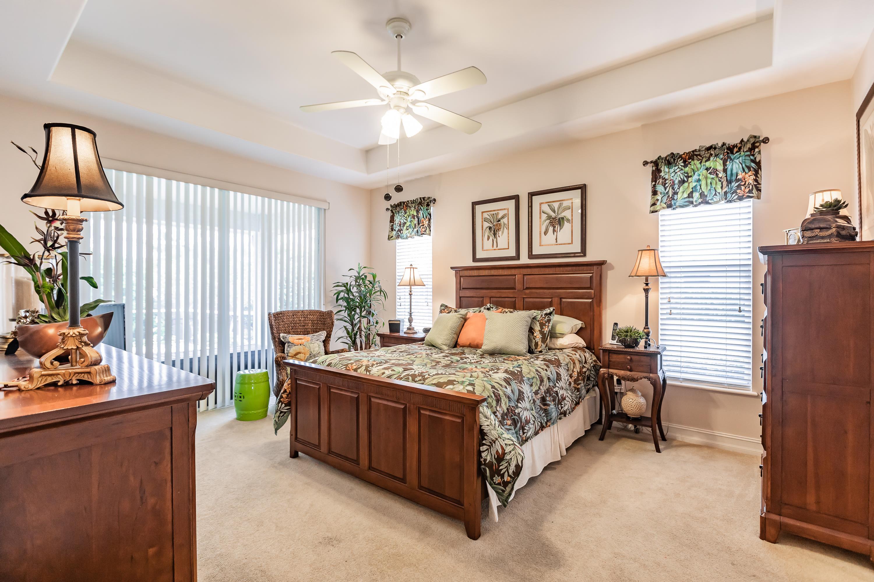 31 Tahiti Road Marco Island, FL 34145 - Photo 15 of 31 a bedroom with a bed and a couch