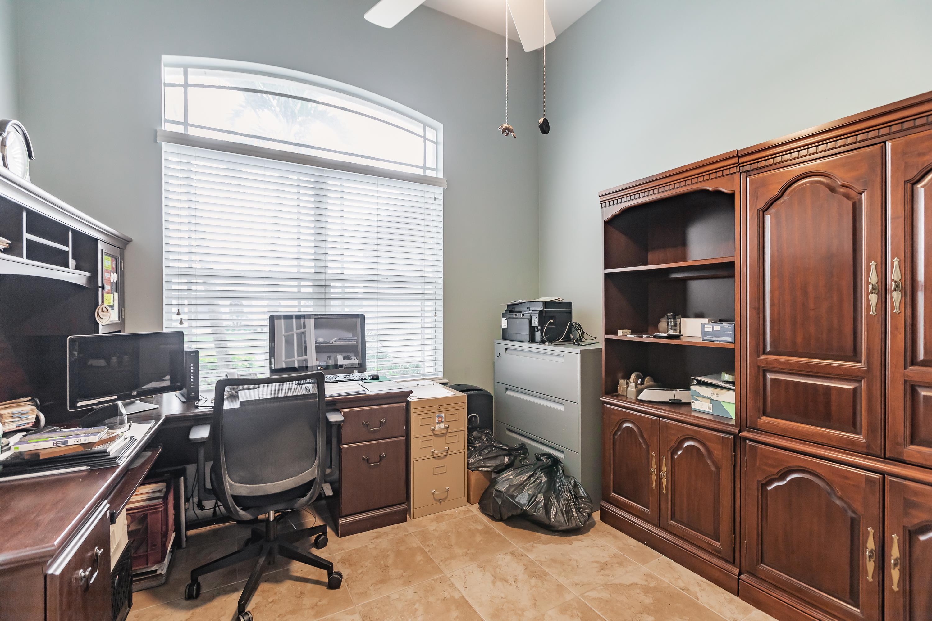 31 Tahiti Road Marco Island, FL 34145 - Photo 26 of 31 a view of a workspace with furniture and a window