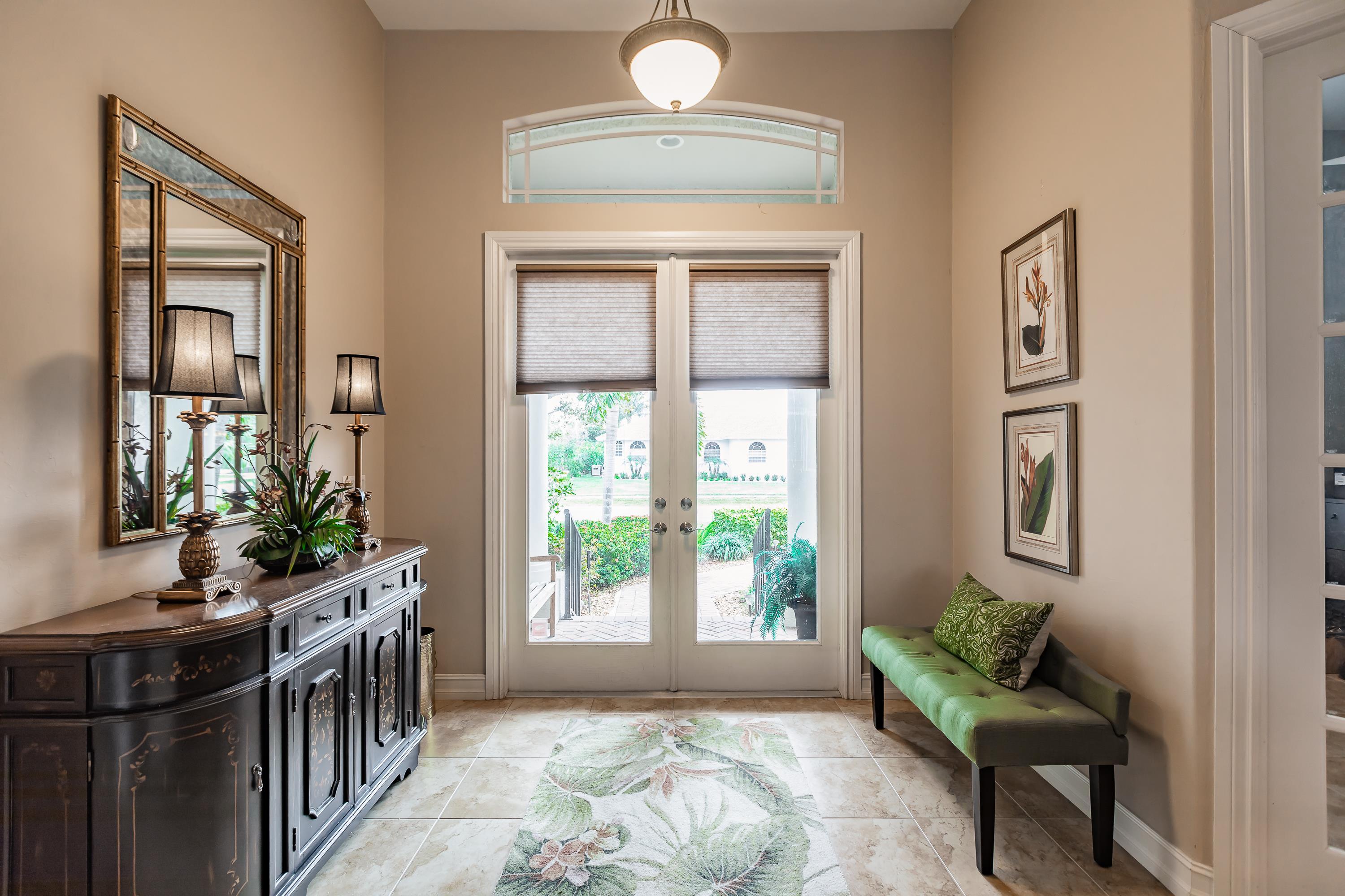 31 Tahiti Road Marco Island, FL 34145 - Photo 5 of 31 a living room with furniture and a window